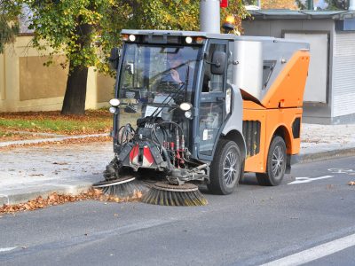 Street cleaning with a sweeper truck